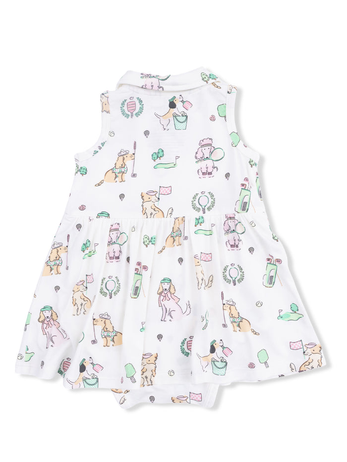 White dress featuring colorful dog illustrations and playful designs on a flared skirt.