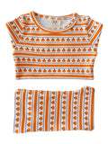 Pumpkin-patterned organic cotton children's outfit in orange and white stripes. Ideal for fall festivities.