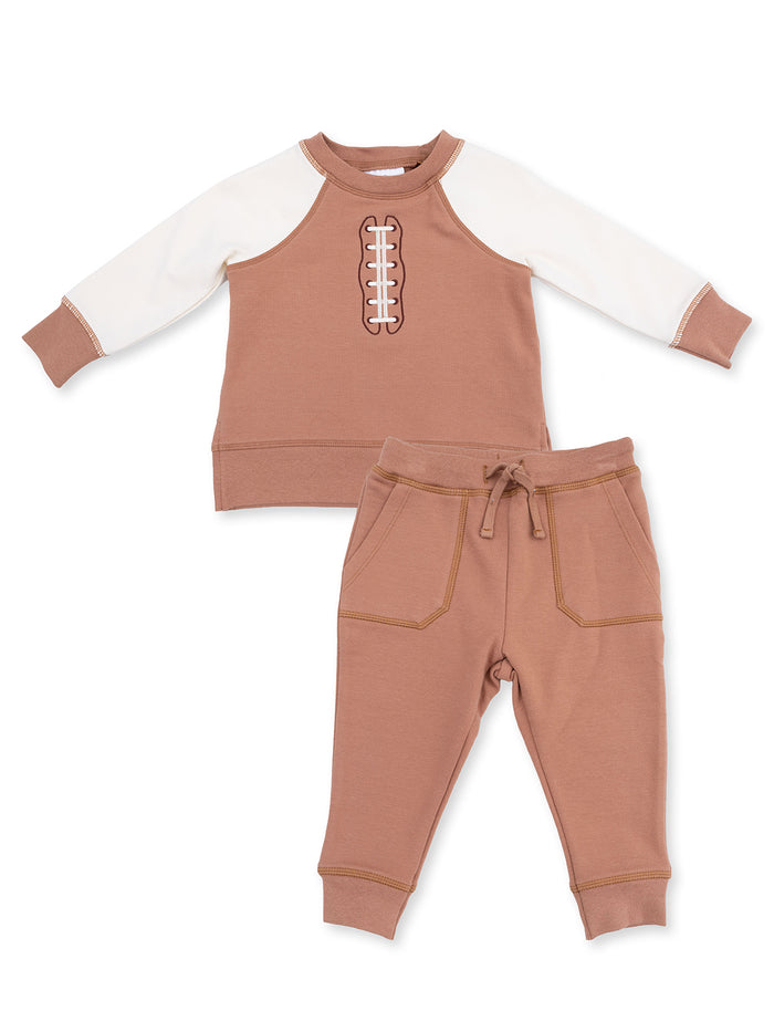 Brown athletic set featuring a football-themed top and matching jogger pants. Perfect for active kids.