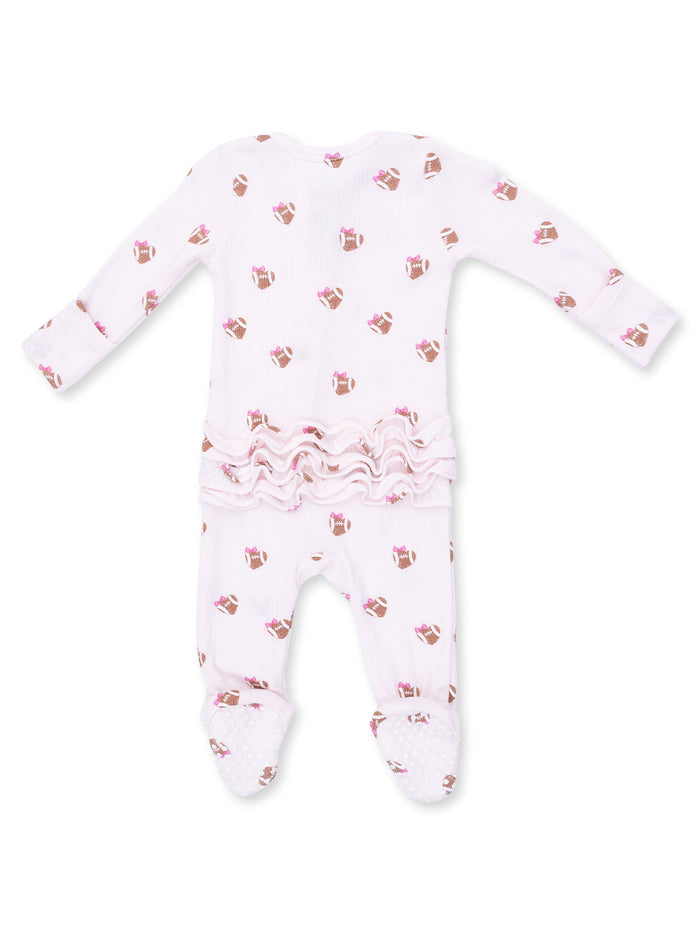 Pink footed baby onesie with cake print and ruffled bottom. Soft and cozy for infant wear.
