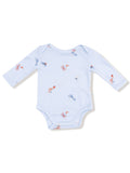 Light blue long-sleeve onesie with colorful sea creature patterns printed throughout.