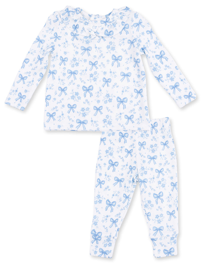 Light blue floral pajama set for children, featuring bows and long sleeves, perfect for bedtime comfort.