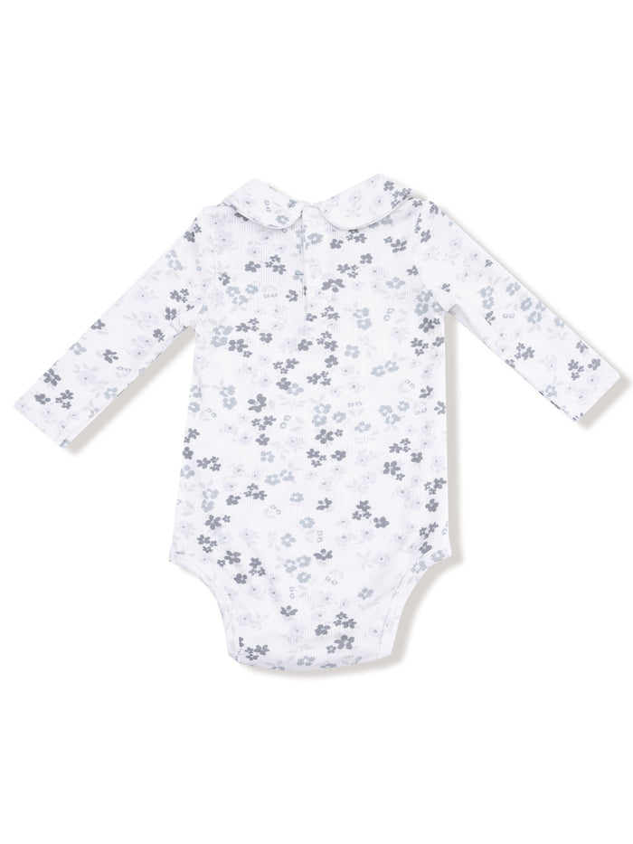 Long-sleeve baby bodysuit with a floral pattern and Peter Pan collar, in shades of gray and white.
