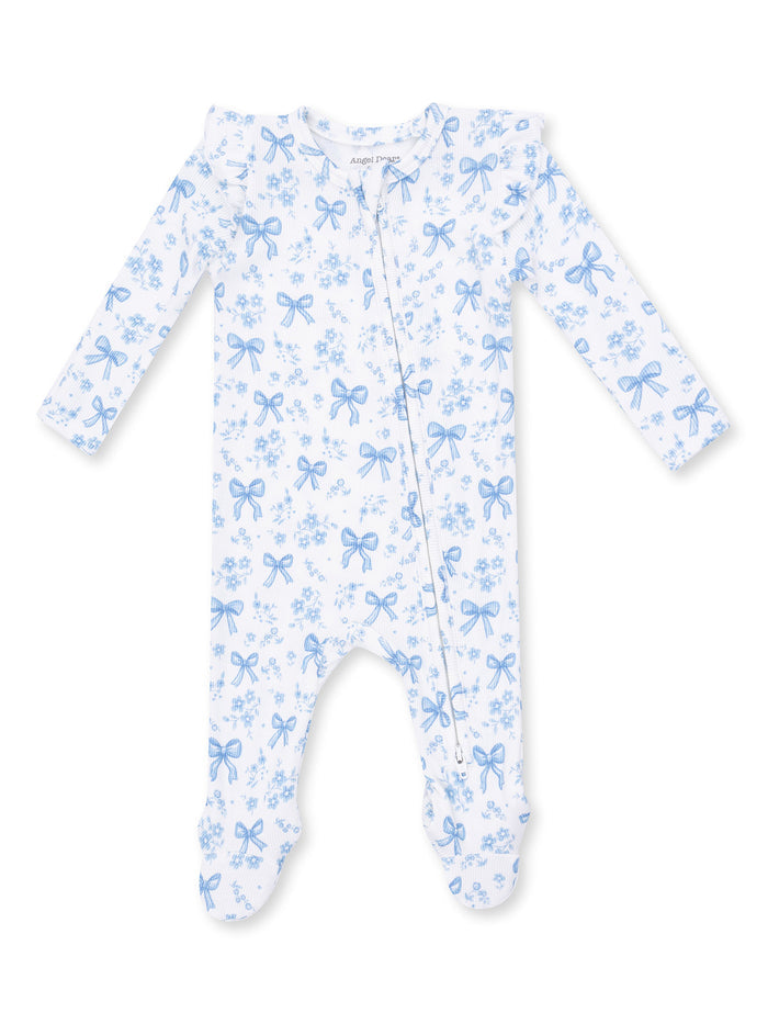 White onesie with blue bows and flowers, featuring long sleeves and footed design.