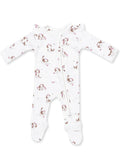 White baby onesie with a cute dog print and floral accents, featuring a front zipper and long sleeves.