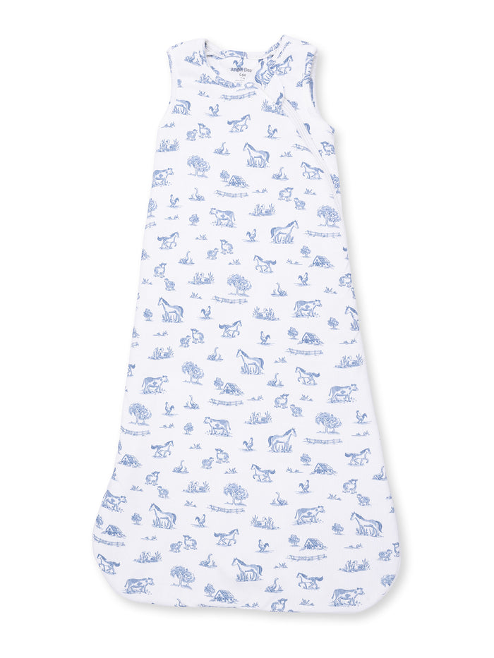 Children's sleep sack featuring blue animal and nature patterns on a white background. Ideal for cozy bedtime.