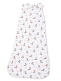 White sleeping bag with cowboy boot and star patterns for infants.