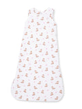 White baby sleep sack with a pattern of brown boots and pink bows. Soft and cozy for infants.
