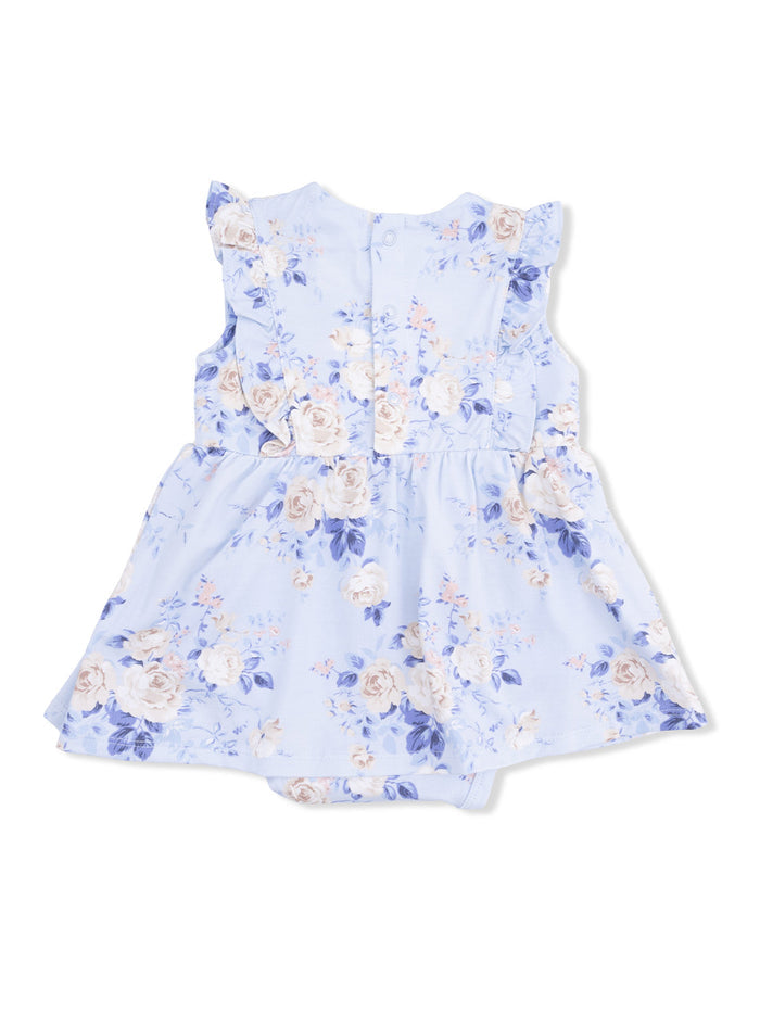 Blue floral baby romper with ruffled sleeves and buttons at the back, perfect for spring or summer occasions.