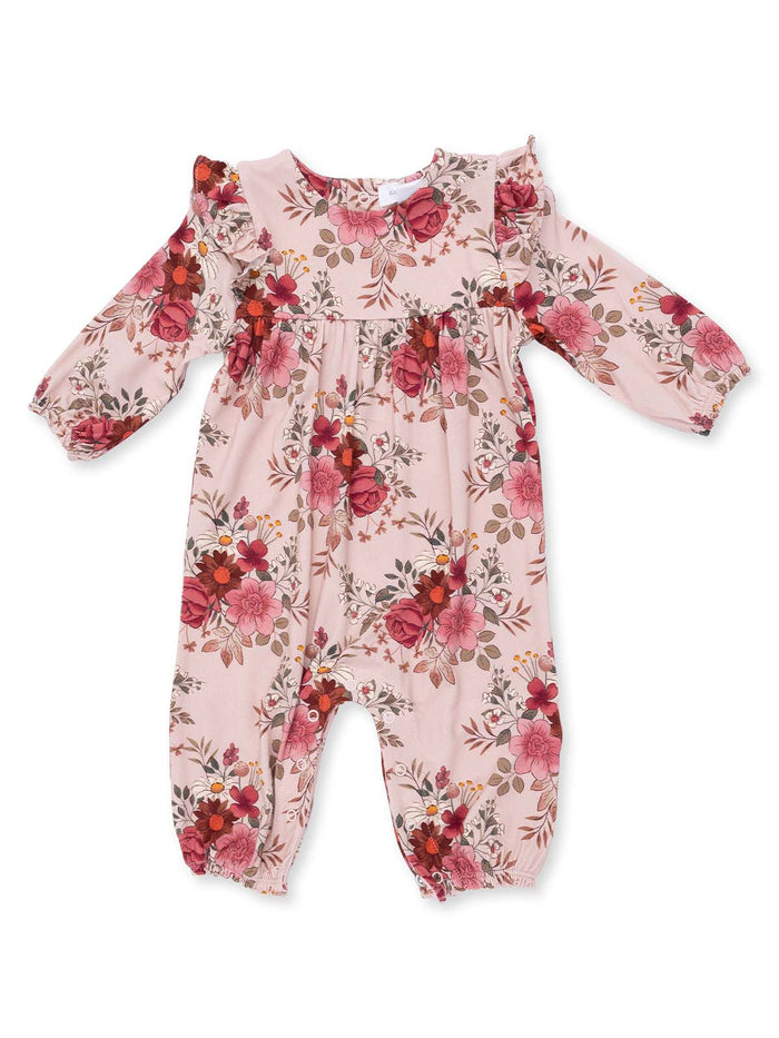 Floral baby romper in pink with ruffled sleeves and elastic cuffs, featuring red and pink flowers.