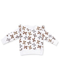 White sweatshirt with colorful bow patterns, featuring ruffled sleeves for a stylish touch. Perfect for kids.