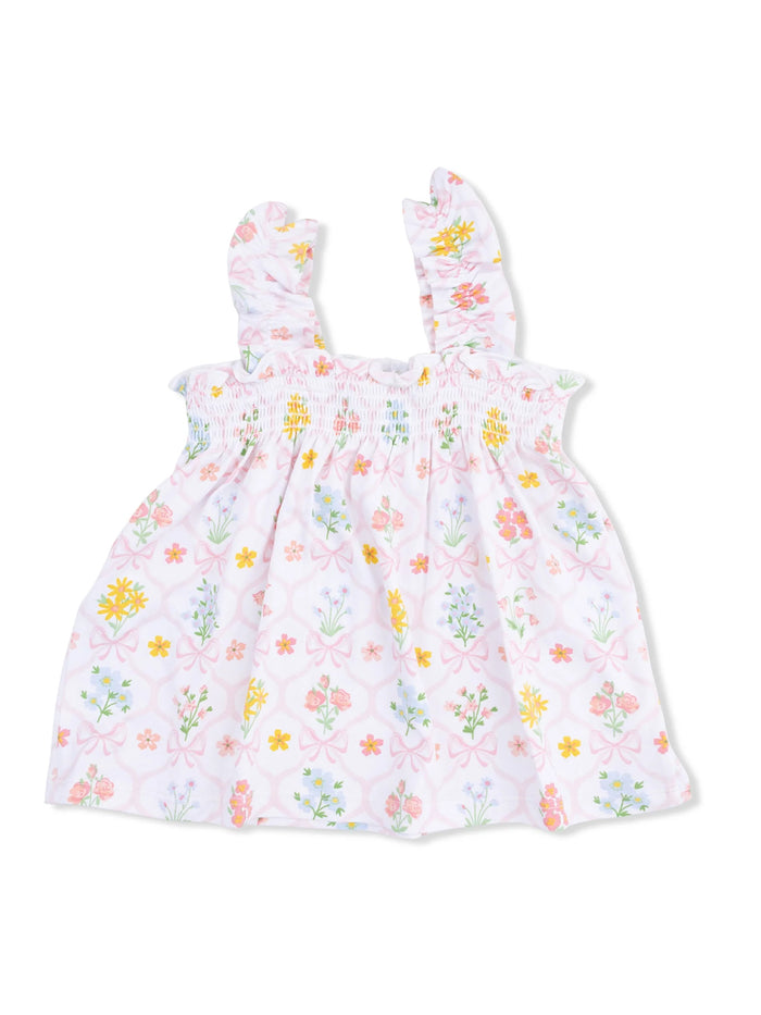 Pink floral dress with ruffled straps and a smocked bodice, perfect for warm weather and casual outings.