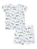 Children's pajama set featuring a playful alligator pattern on a white background.