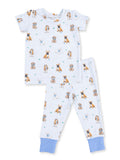 Light blue pajamas with a playful dog print, featuring short sleeves and comfy pants with blue cuffs.