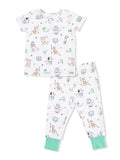 Children's pajama set featuring playful dog prints, including golf, ice cream, and balloons on a white background.