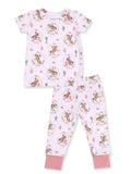 Pink children's pajama set featuring playful horse-themed prints and floral designs, including a short-sleeve top and pants.