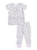 Floral children's pajama set in lavender and white, featuring a short-sleeve top and matching pants.