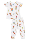 Children's pajamas featuring colorful cowboy and cowgirl illustrations on a white background.