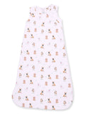 Light pink baby sleep sack with various cartoon dog patterns throughout. Ideal for comfort and safety.
