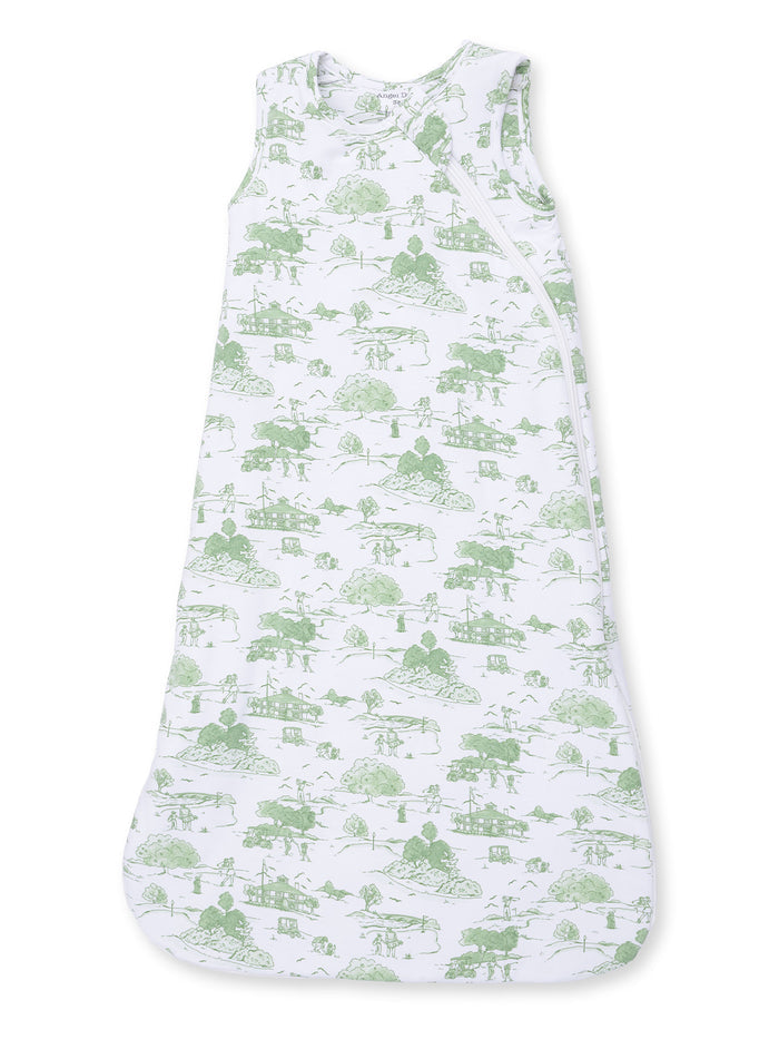 Lightweight white sleep sack with green nature-themed print, ideal for keeping babies warm and comfortable.