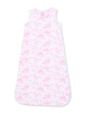 Light pink baby sleeping bag with whimsical nature patterns and sleeveless design.