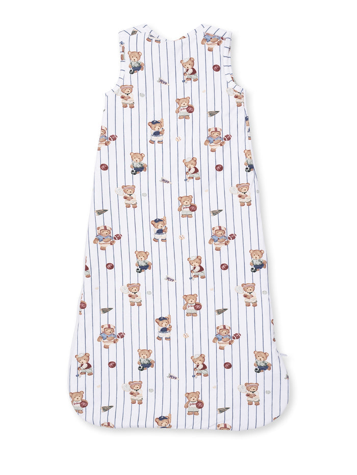 Children's sleep sack featuring playful teddy bear designs on a striped white background.