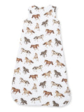 Child's sleep sack featuring a playful horse print in various colors on a white background.