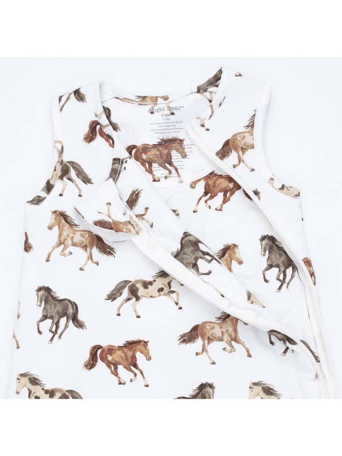 White garment featuring a playful horse print, ideal for infants, by Angel Dear, size 0-6 months.