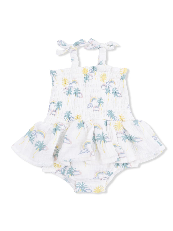 White dress with pastel palm tree and rainbow pattern, featuring straps and a flared skirt for toddlers.