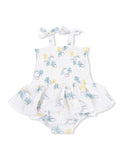 White dress with pastel palm tree and rainbow pattern, featuring straps and a flared skirt for toddlers.