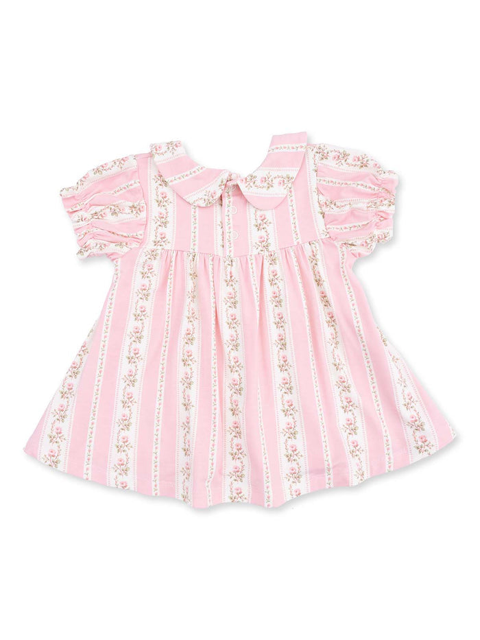 Pink striped dress with floral accents and puff sleeves, featuring a Peter Pan collar and button details.