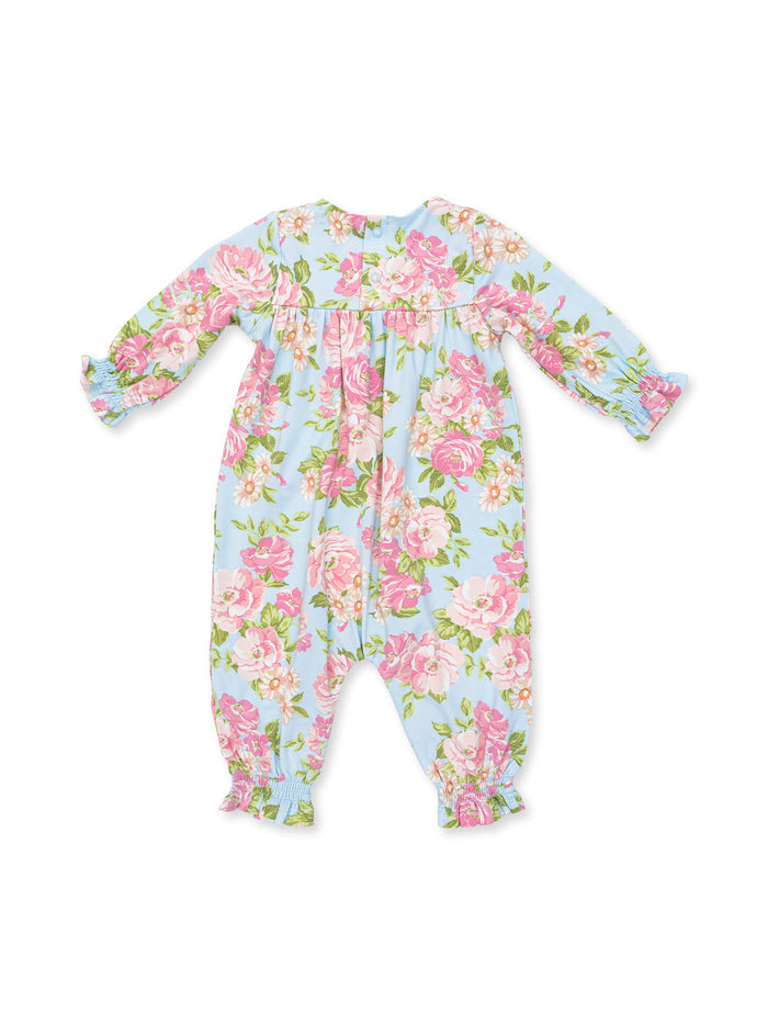 Floral baby romper in pastel blue with pink roses, long sleeves, and ruffled cuffs. Ideal for warm weather.