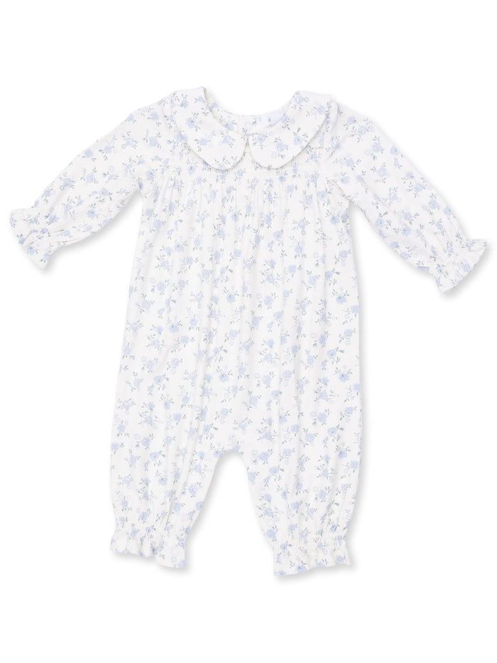 White baby romper with blue floral pattern and Peter Pan collar, featuring long sleeves and elasticized cuffs.