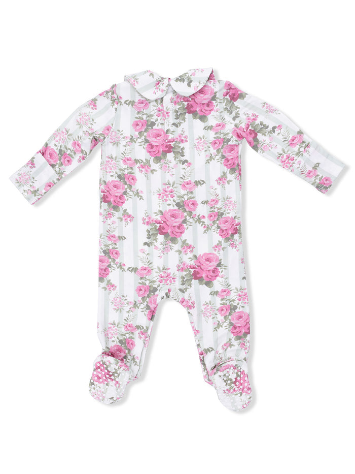 White floral baby romper with pink roses and a collar, featuring long sleeves and footed design.