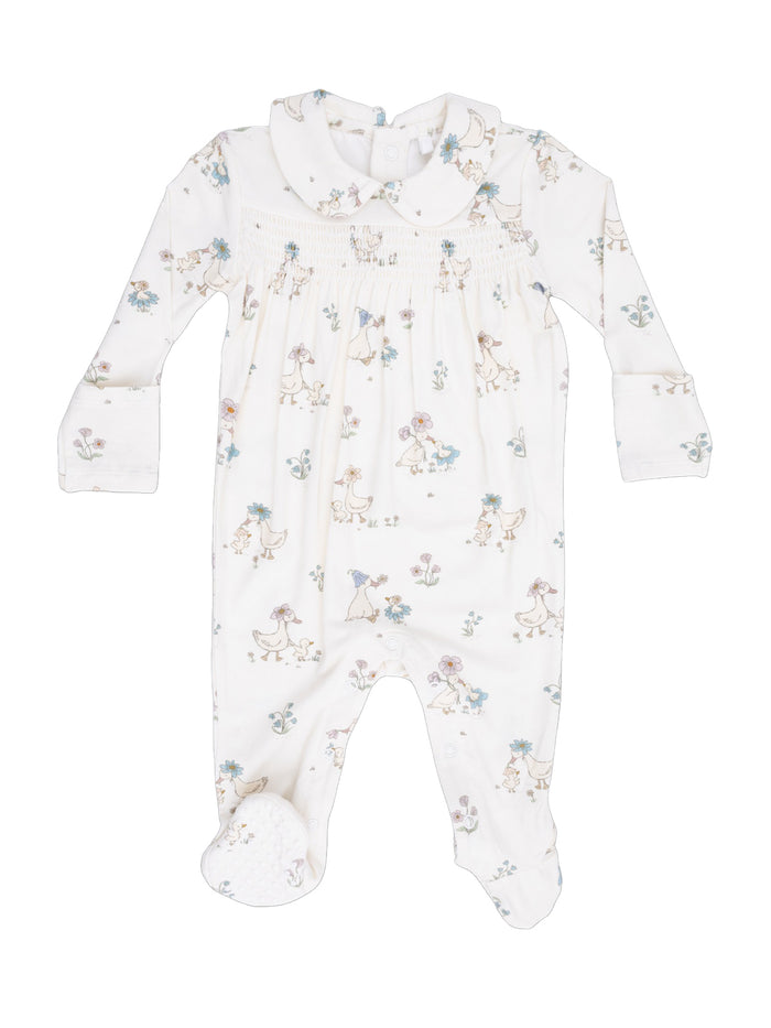 White baby onesie with playful floral and animal prints, featuring long sleeves and footed design.