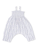 White baby romper with blue floral patterns and ruffled straps, designed for comfort and style.