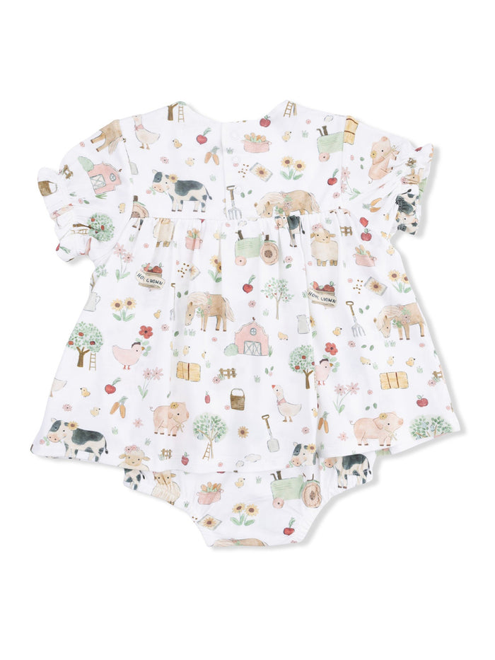 Child's romper suit featuring a pastel farm animal print on a white background.