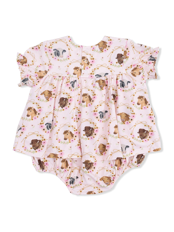 Pink baby dress with whimsical animal prints, featuring short ruffled sleeves and a gathered bottom.