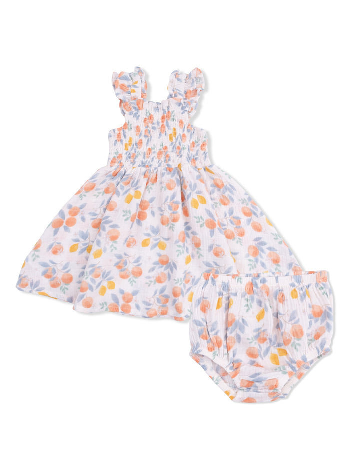 Floral toddler dress with ruffled straps and matching bloomer shorts in soft pastel colors.
