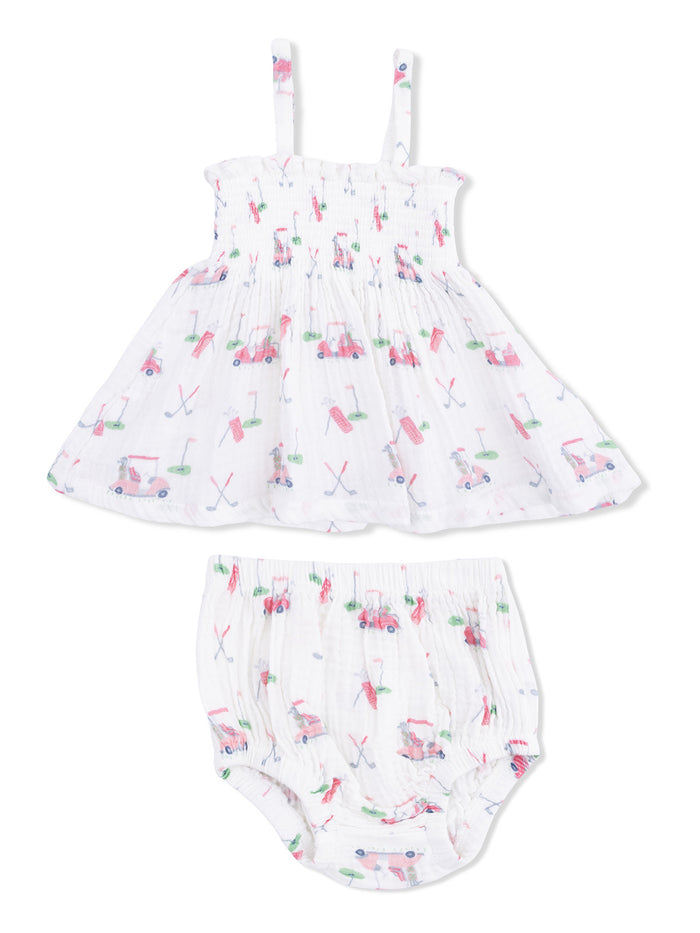 Girls' dress and bloomers set with playful golf-themed prints in pastel colors. Adjustable straps and soft fabric.