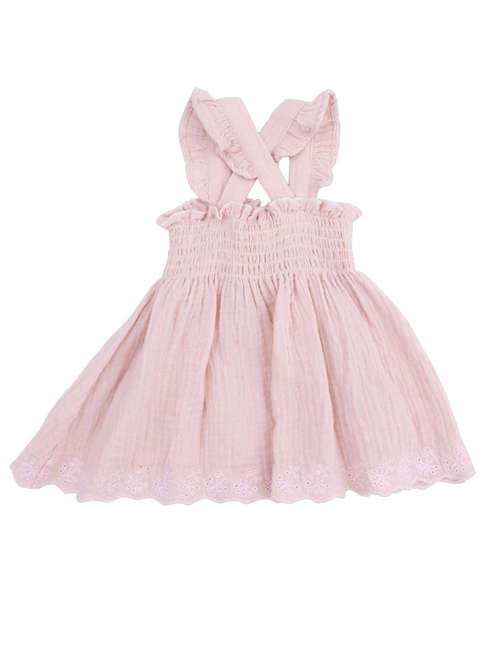 Light pink dress with ruffled straps and floral embroidered hem, perfect for summer outfits.