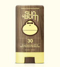 Sun Bum sunscreen face stick with wooden top and yellow base on a white background