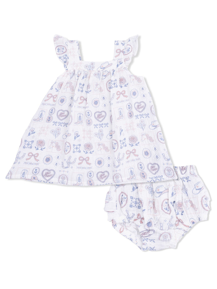White baby dress with ruffled sleeves and matching bloomers featuring colorful, playful patterns.