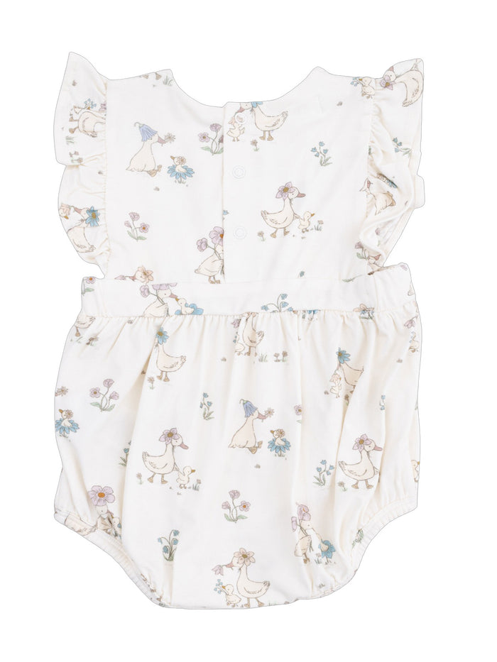 Infant romper with a whimsical duck pattern and floral design, featuring ruffled sleeves and button closure at the back.