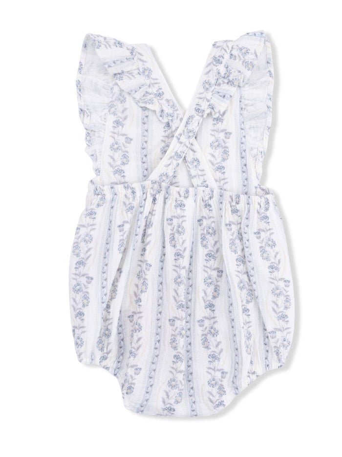 White floral romper with blue detailing and ruffled sleeves, designed for infants and toddlers.