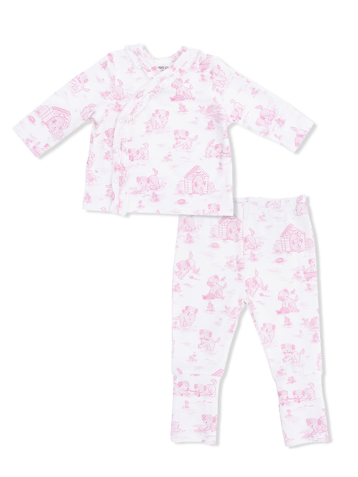 Pink children's pajama set featuring playful animal prints of puppies and their surroundings.