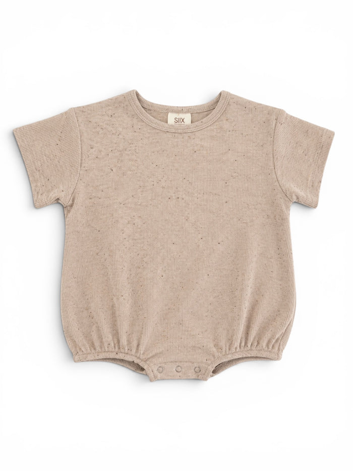 Light beige baby onesie with short sleeves and snap closures at the bottom, featuring a textured fabric.