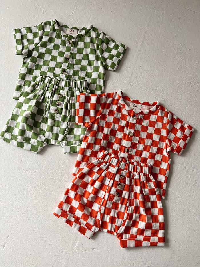 Two checkered outfits: green and white, and red and white, displayed on a light background.