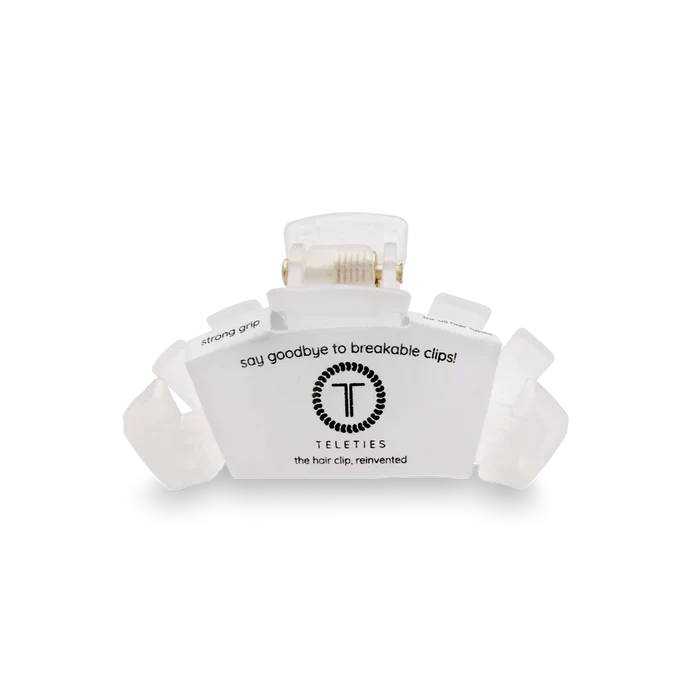 White hair clip with a label 'Teleties' on a white background