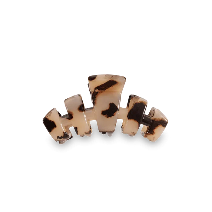 Tortoiseshell print hair clip with a label 'Teleties' on a white background